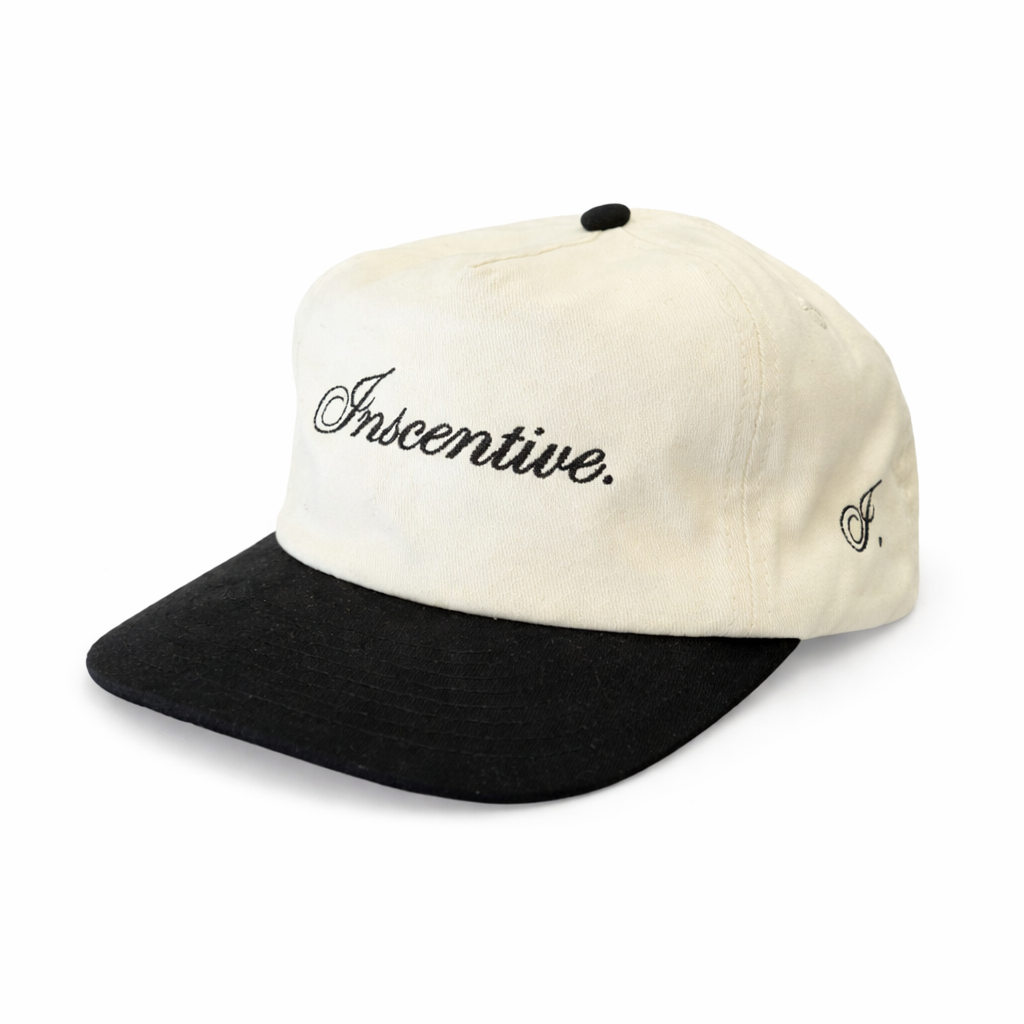 black cursive inscentive cap